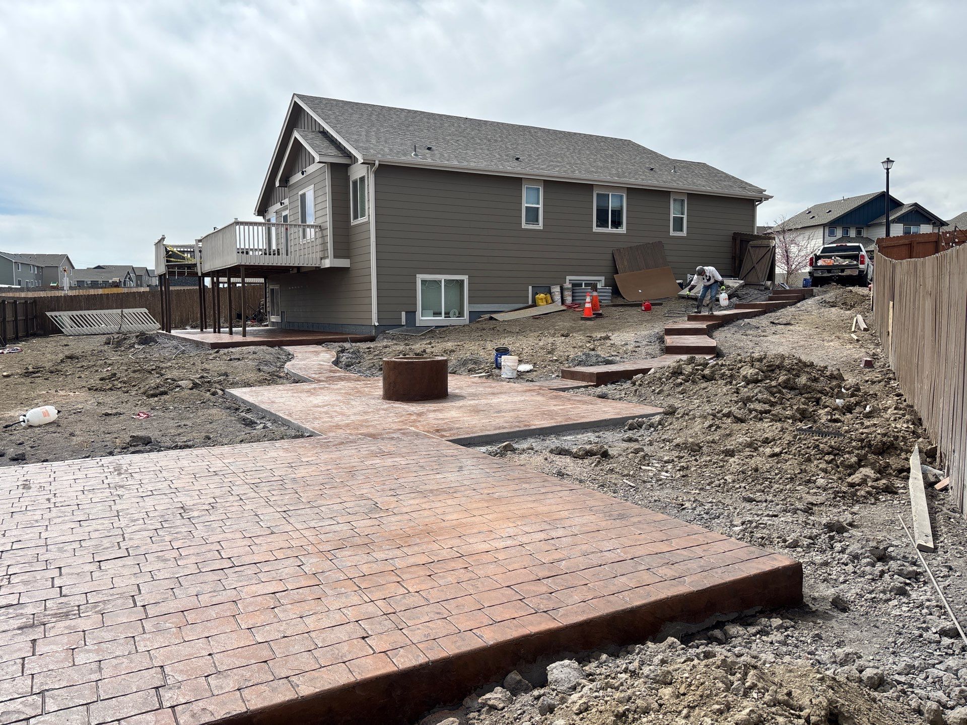 Stamped concrete patio and walkway installed by Fort August Foundation in Colorado