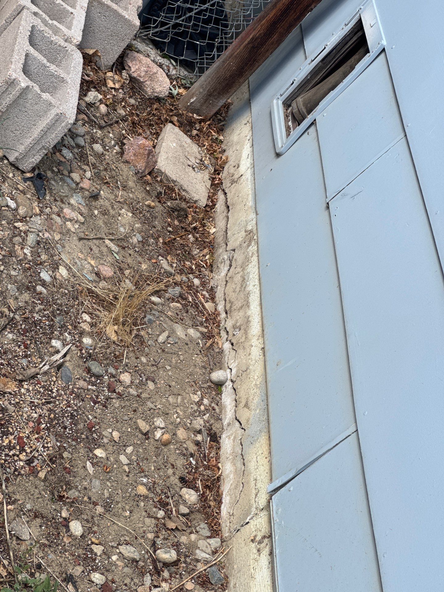 Exterior foundation wall cracking in Longmont Colorado inspected by Fort August Foundation for settlement and structural movement issues