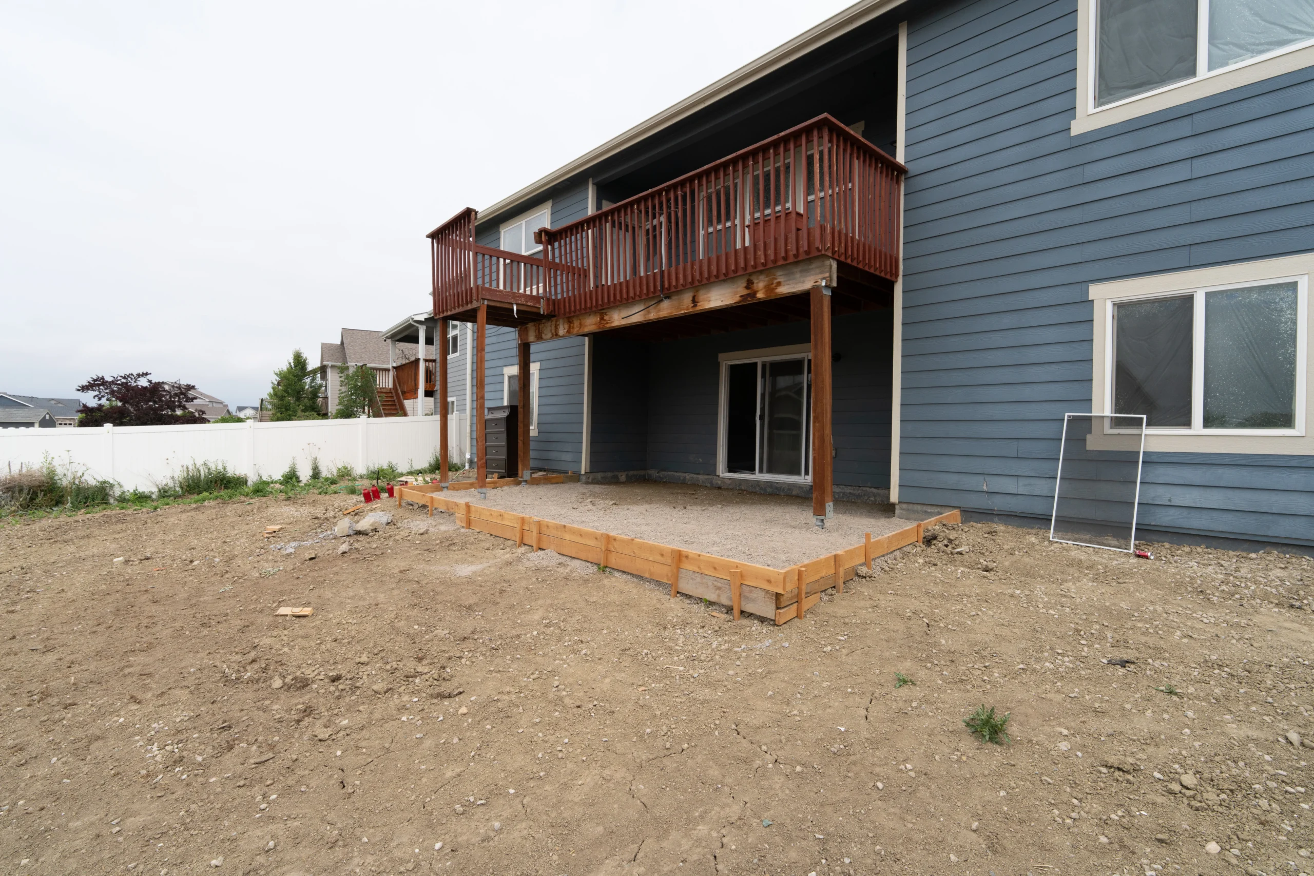 Concrete patio preparation in Berthoud Colorado by Fort August Foundation including excavation, grading, and base preparation for durable concrete flatwork. Fort August Foundation preparing a new concrete patio in Berthoud, Colorado through professional excavation, grading, and base preparation. Proper site preparation helps ensure long-term durability, minimizes settlement issues, and supports proper drainage. Our team focuses on quality concrete flatwork built to perform for years to come.