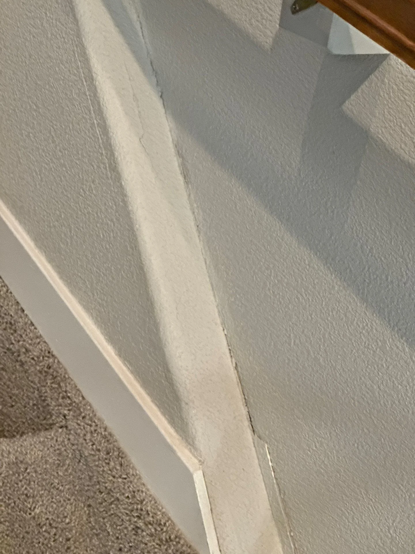 Vertical drywall corner cracking documented during a Colorado Springs foundation inspection by Fort August Foundation.
